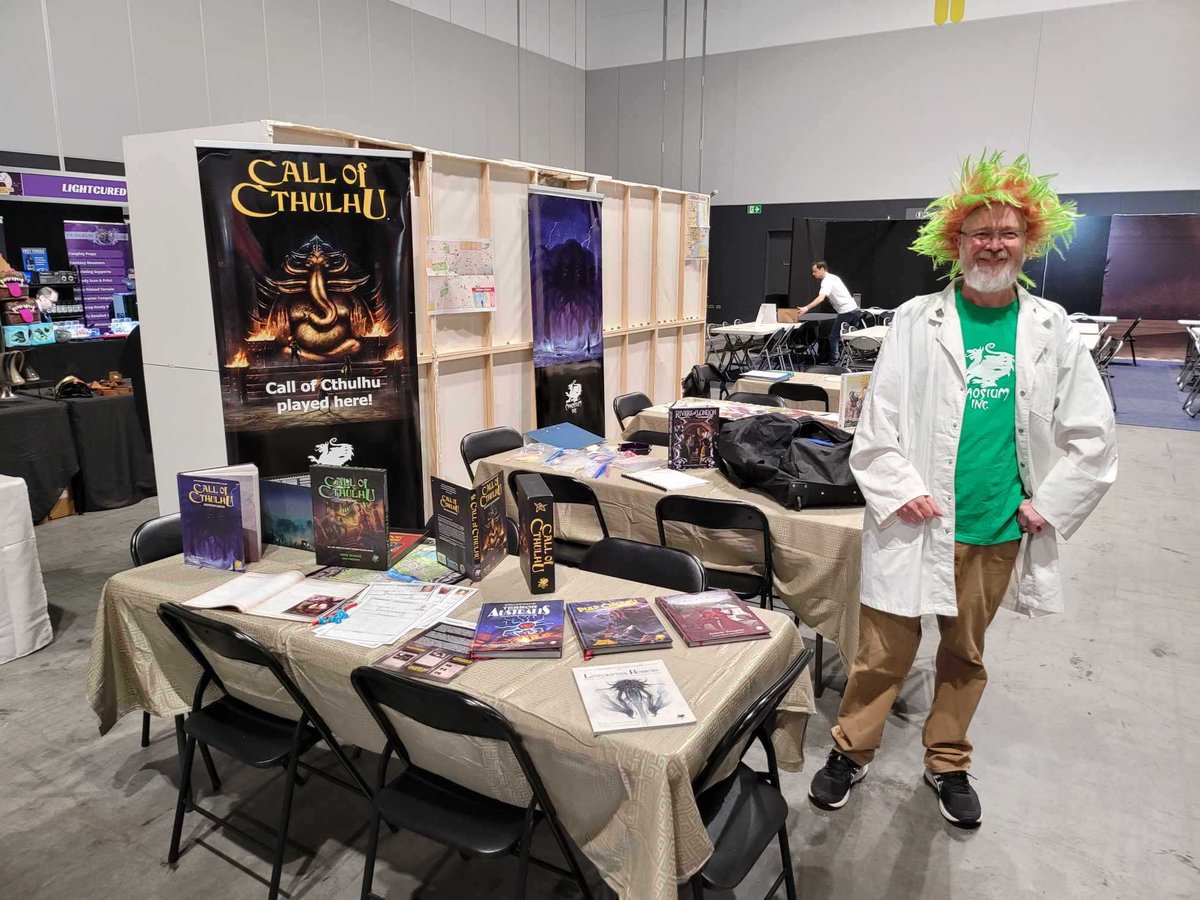 Chaosium_Inc's tweet photo. While the fun goes on at Chaosium Con in Ann Arbor๐บ๐ธ, on the other side of the planet Cult of Chaos Keeper Pete Shanahan is having a great time flying the Chaosium flag at #GenerationGames in Sydney๐ฆ๐บ https://t.co/DS0Ad2G50y
