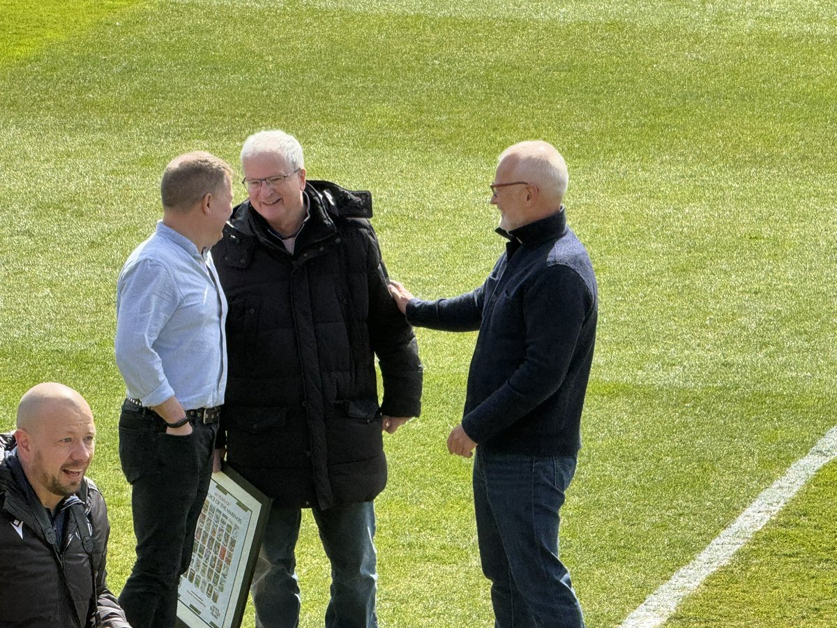 @JohnTondeur at his final official game at Blundell Park today receiving a gift of town chairman @jstockwood and Andrew Petit. #townlegend #voiceofthemariners