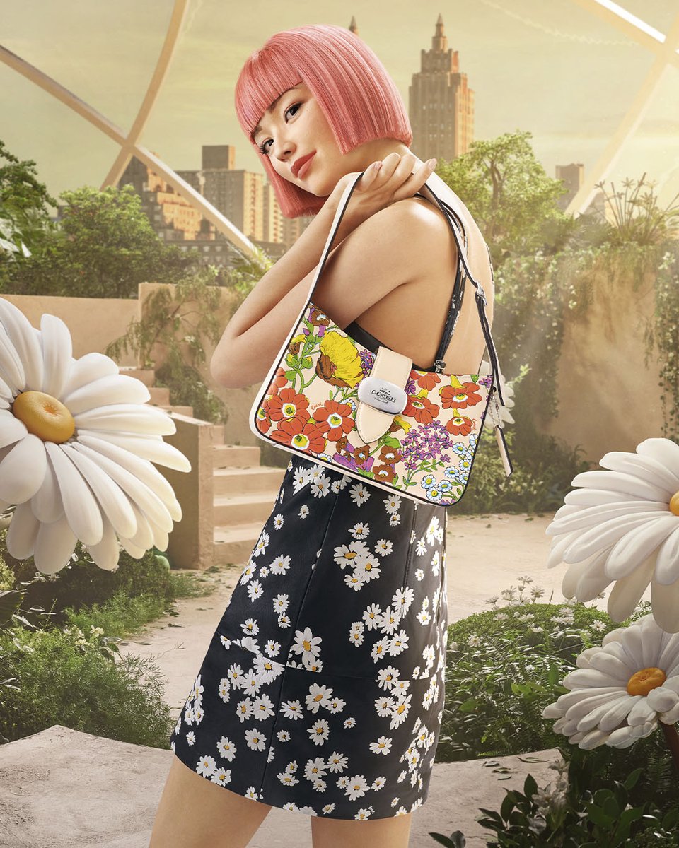 Our Eliza Shoulder bag, now petal-powered. 💐

Find your courage. This season, travel through virtual worlds with #imma as she discovers the #CourageToBeReal (with a little help from the Coach Family).

on.coach.com/FYCOutlet

#CoachOutlet