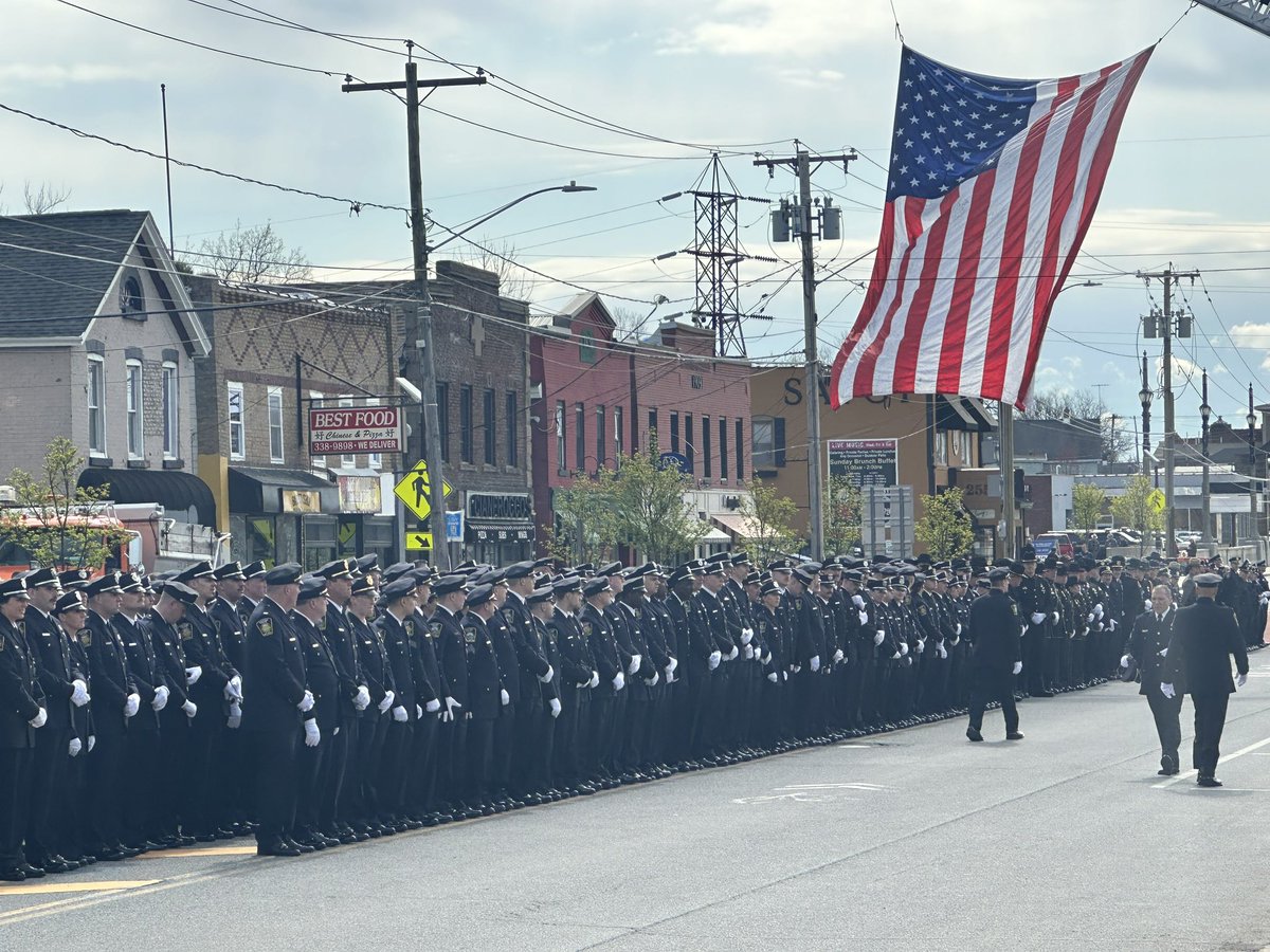 Most of the @SyracusePolice Department gathers in formation before the funeral of fallen Officer Michael Jensen in his hometown of Rome.