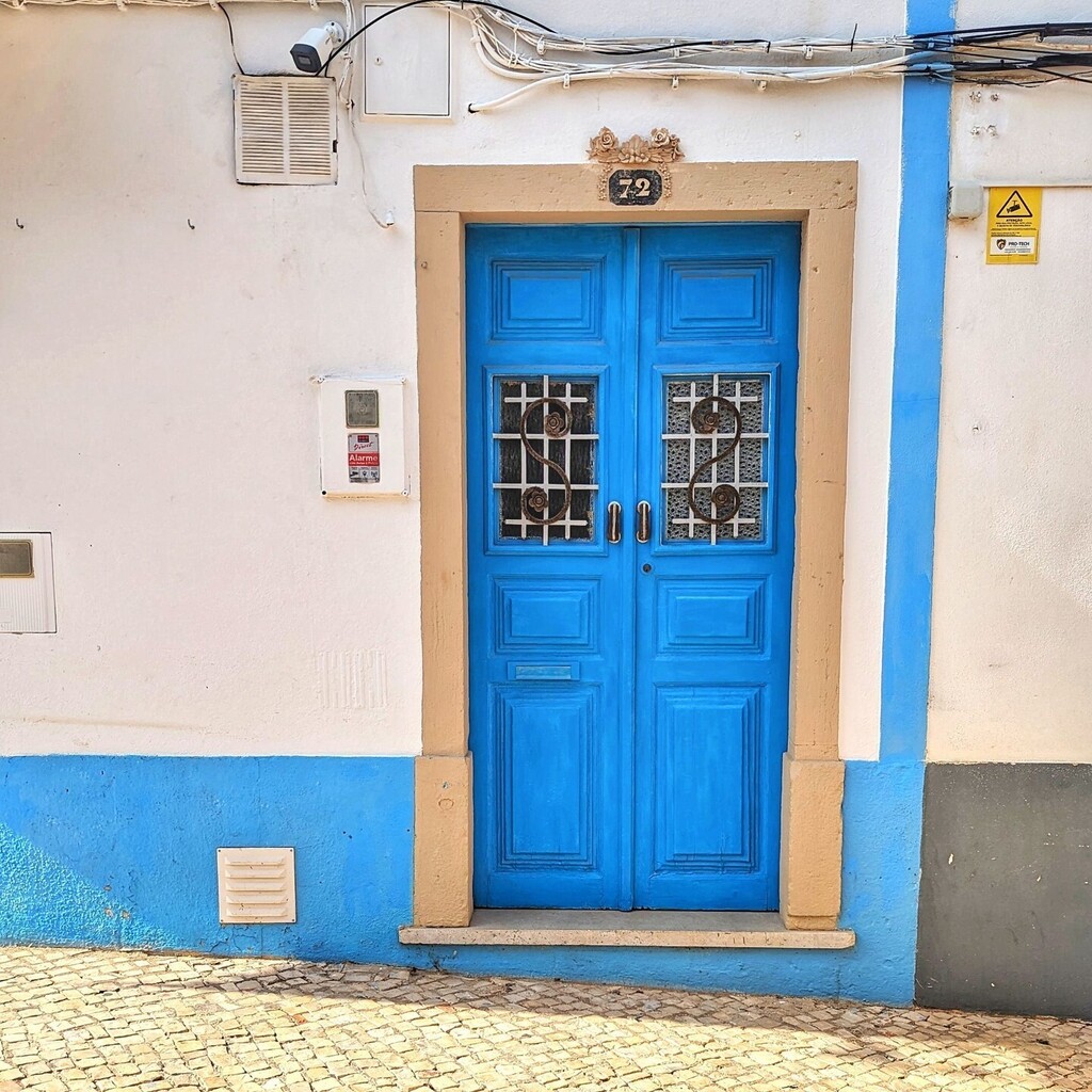 Amazing electric blue door in Lagos Portugal. instagr.am/p/C5_IPchMvhB/