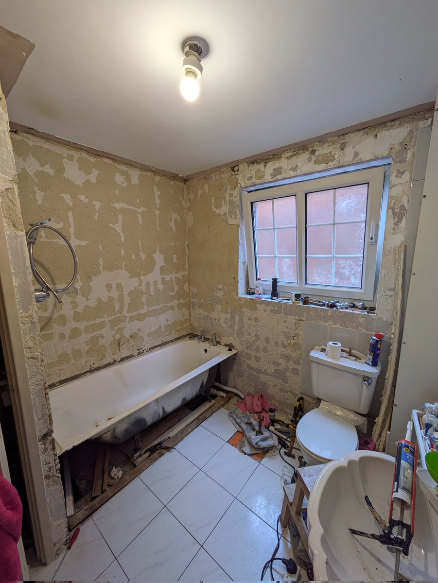 Eight hours, two grandads and a leak in the roof later, stage one is nearly complete. Bath is plumbed in and most of the tiles are off. This is not fun.