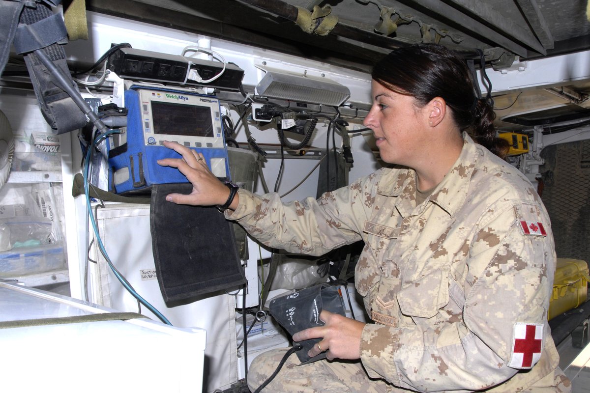 Inside an armoured ambulance, Corporal Christa Manning, a medical technician based at 2 Canadian Field Ambulance in Petawawa, Ontario checks the Pro Pack. This piece of equipment monitors a patient’s blood pressure, pulse, oxygen levels, and can also check the heart rhythm.