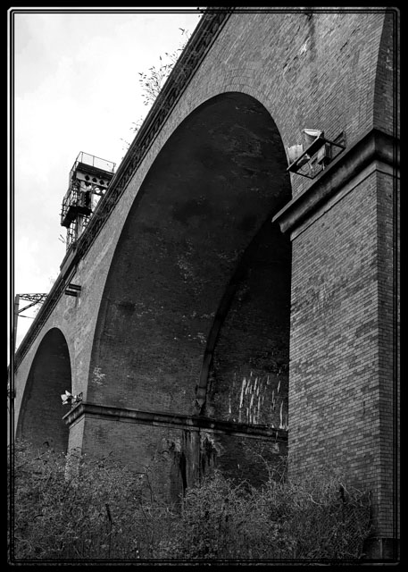 The #railway #viaduct is a major #landmark through the city of #Stockport in the #northwest of #England @networkrail. Shot in #blackandwhite from a low angle to highlight its size. #blackandwhitephotography.  For more like this or to #order a #print, see darrensmith.org.uk