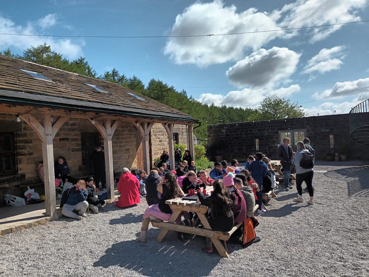 The children are enjoying break time in the sunshine with the children from Grimes Dyke School #friendship #enrichment #NewExperiences