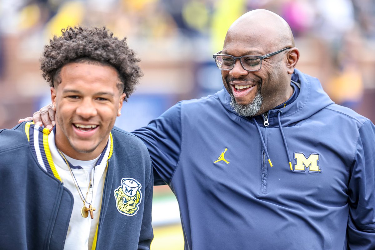 Former Ohio State coach Tony Alford and Mr. Ohio Jordan Marshall wearing maize and blue.