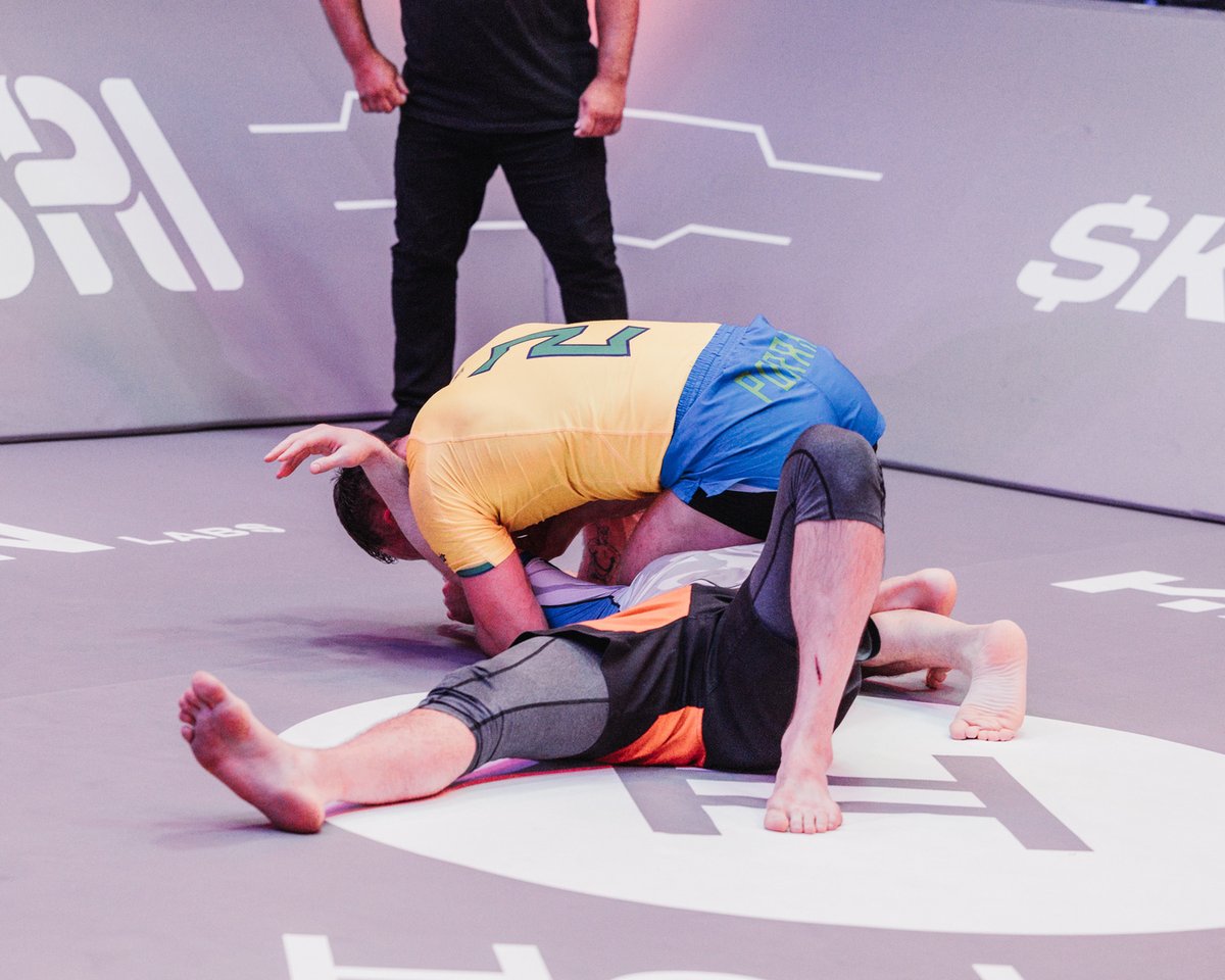 KarateCombat's tweet photo. He's done it AGAIN! CRAIG JONES caught Rinat Fakhretdinov in a triangle and progresses to 2-0 in the Pit! 

#KC45 | Live Now | #FreeOnYoutube https://t.co/BhMFcH7izX