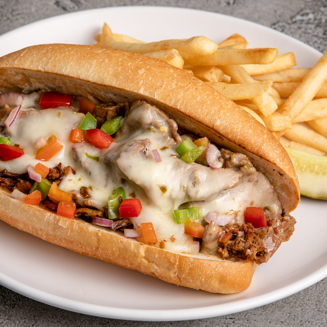 Make it a cheesy Saturday and indulge in our Times Square Cheesesteak! It features our melt in your mouth Brisket of Beef, grilled peppers & onions with melted Pepper Jack cheese on fresh baked French Bread.