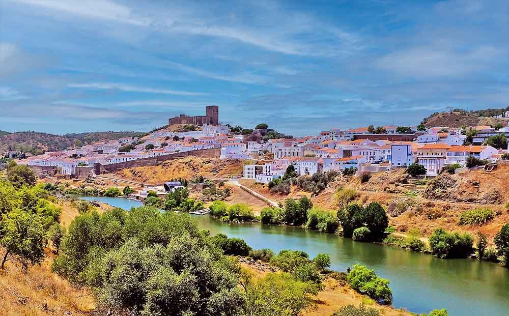 Looking for the real Portugal? Visit Mértola, a picturesque riverside town with a unique Islamic heritage in the heart of the idyllic Alentejo region; portugaltravelguide.com/mertola/