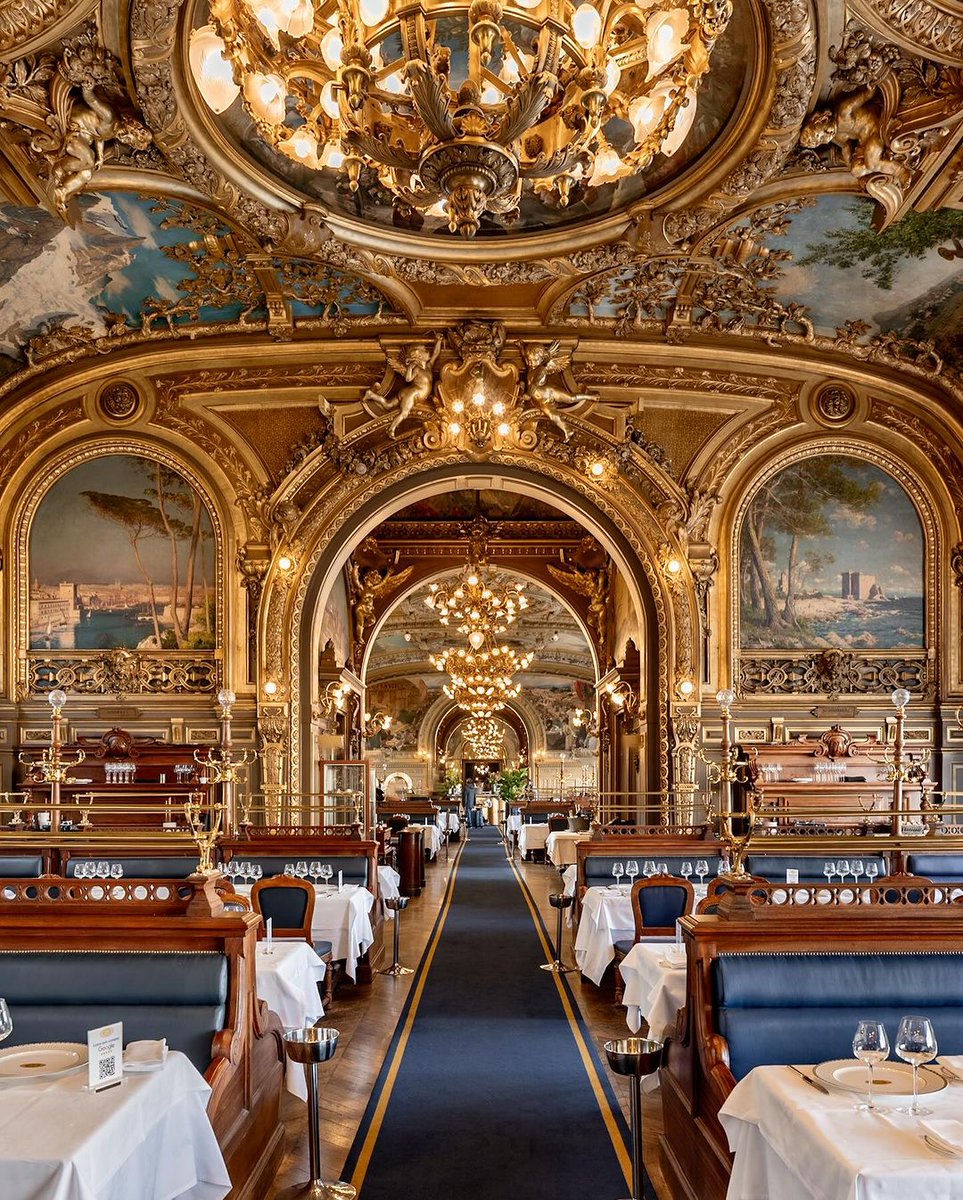 Paris, France 🇫🇷 Le Train Bleu restaurant, opened in 1901, is located inside the Gare de Lyon train station. The restaurant's interior is famous for its ornate and lavish Belle Époque decor, featuring elaborate frescoes, gilded moldings, and luxurious furnishings, creating an