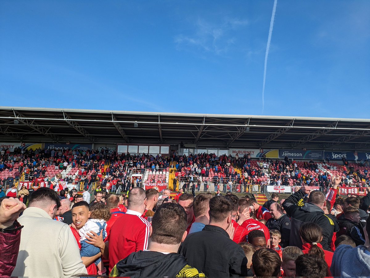 A year ago, almost exactly to the day, @Portadownfc were relegated amid incessant rain in Dungannon. Today, the sun shone all day and the Ports are going back up. In between, we've lost a lot of people who would have loved to have seen this day. I'm sure they are smiling with us