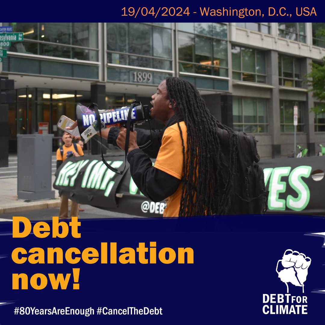 Debt for Climate DC blocked the road outside the @IMFNews and @WorldBank Spring meetings, performing street theater to illustrate how the IMF crippling loans shackle the Global South! #80YearsAreEnough #CancelTheDebt