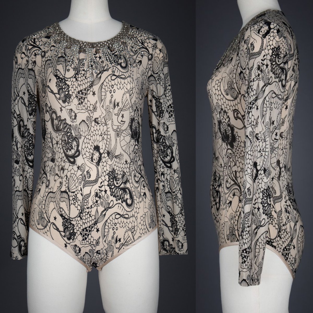 This @bebaroque bodysuit has a base of nylon mesh, printed with sailor tattoo inspired motifs such as mermaids, swallows, ropes, anchors and pin-up girls. Explore this piece in further detail on our website! underpinningsmuseum.com/museum-collect…