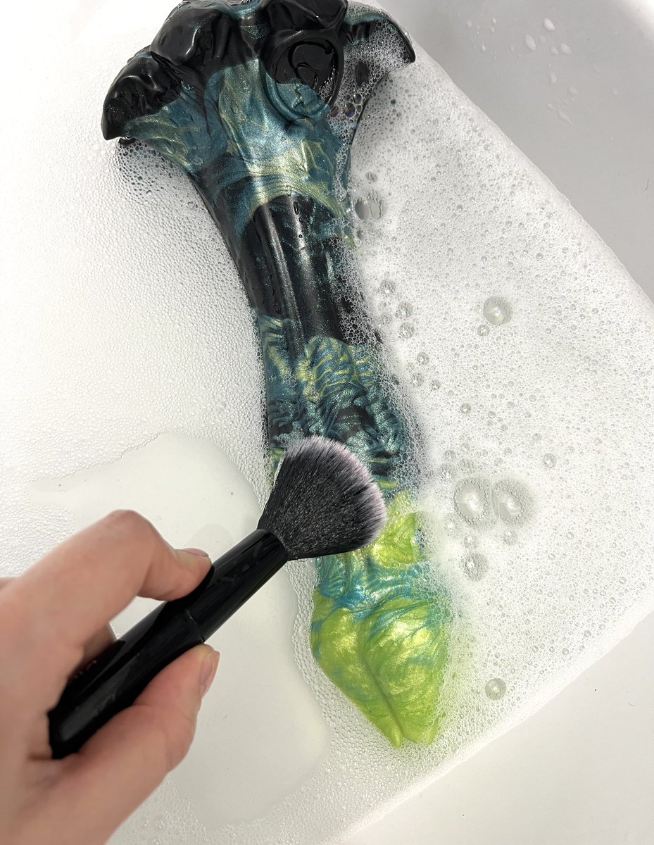 You can use a soft makeup brush and soap to clean 🧼🫧