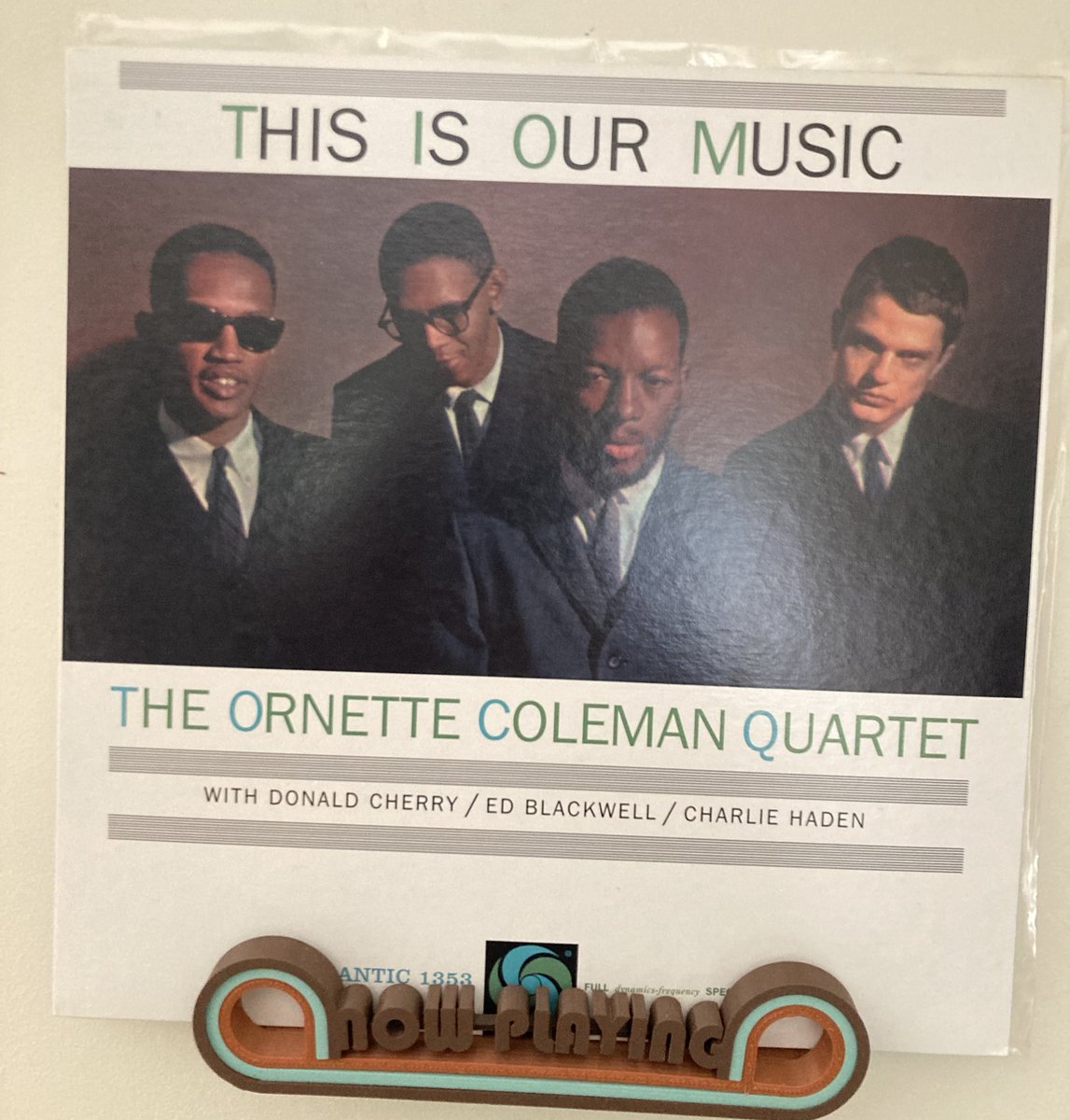 Platonic ideal of a certain kind of jazz cover: declarative title, clean lines, a sharply dressed multi-racial band who look zooted out of their minds