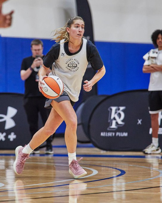 Kate Martin taking part in the Kelsey Plum Dawg Class Camp. via Under Armour Basketball