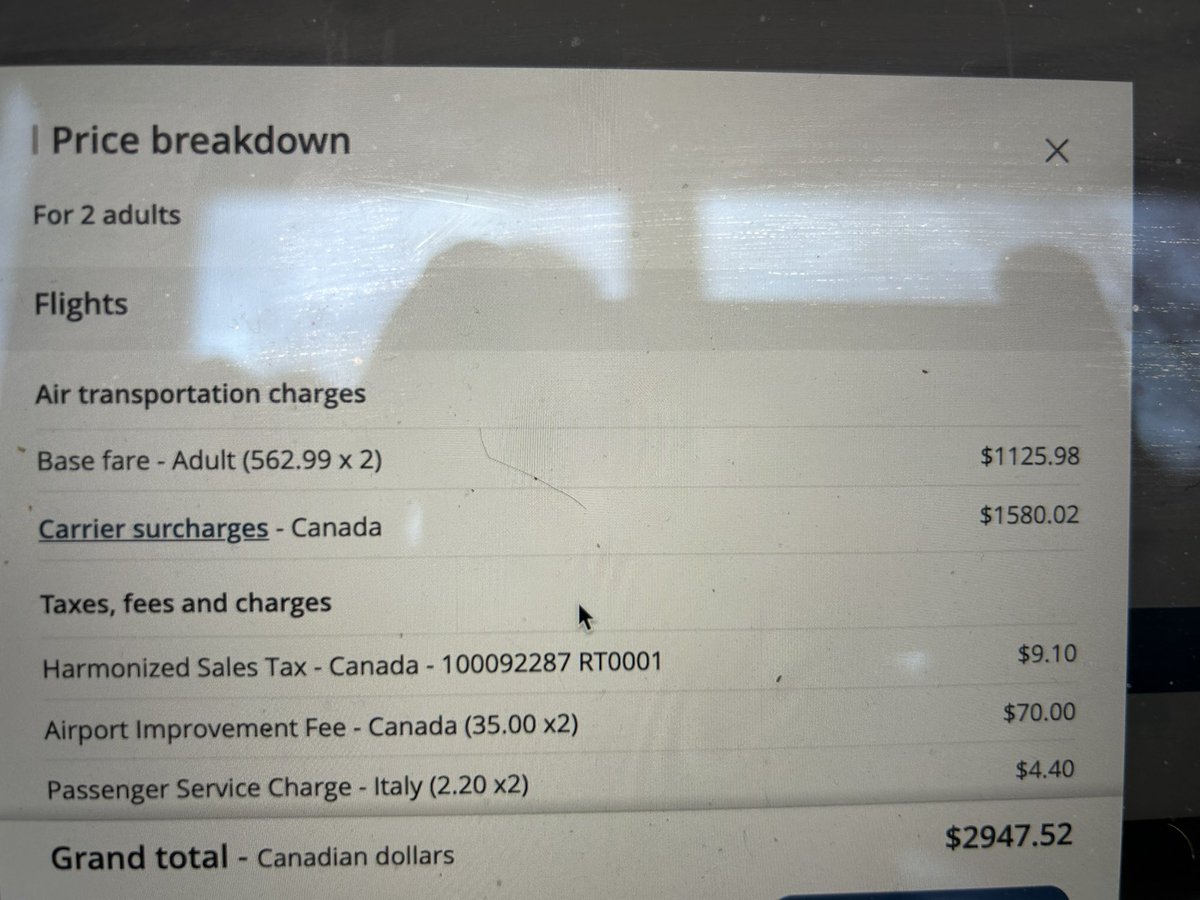 Littzen's tweet photo. @AirCanada $1580 in surcharges on standard 2 standard economy tickets - what economic witchcraft are you doing up there #ScamAlert #CanadaNewsToday https://t.co/tMWHVWdmAz