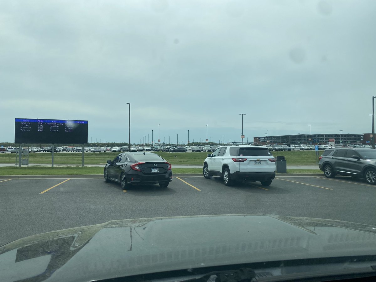 A pair of assholes in the cellphone lot at XNA