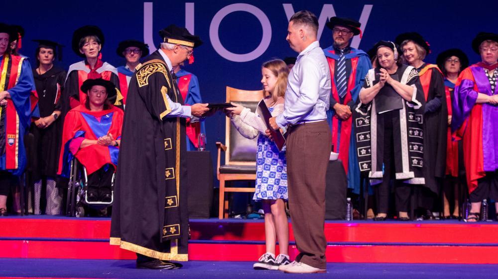 Beloved #UOW academic and passionate nurse, Dr Kimberley Livingstone was awarded a posthumous PhD this week. She passed away in late January, at the age of 42, after a lifelong battle with cystic fibrosis. 👉 bit.ly/3VZnhG5 #UOWGrad2024