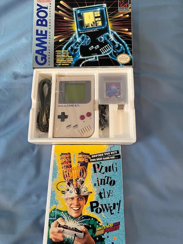 I actually own a brand new original Game Boy (and Tetris) in perfect condition. I received it as a gift from a family member many years ago. That family member passed away not long after, so it’s a special part of my collection.