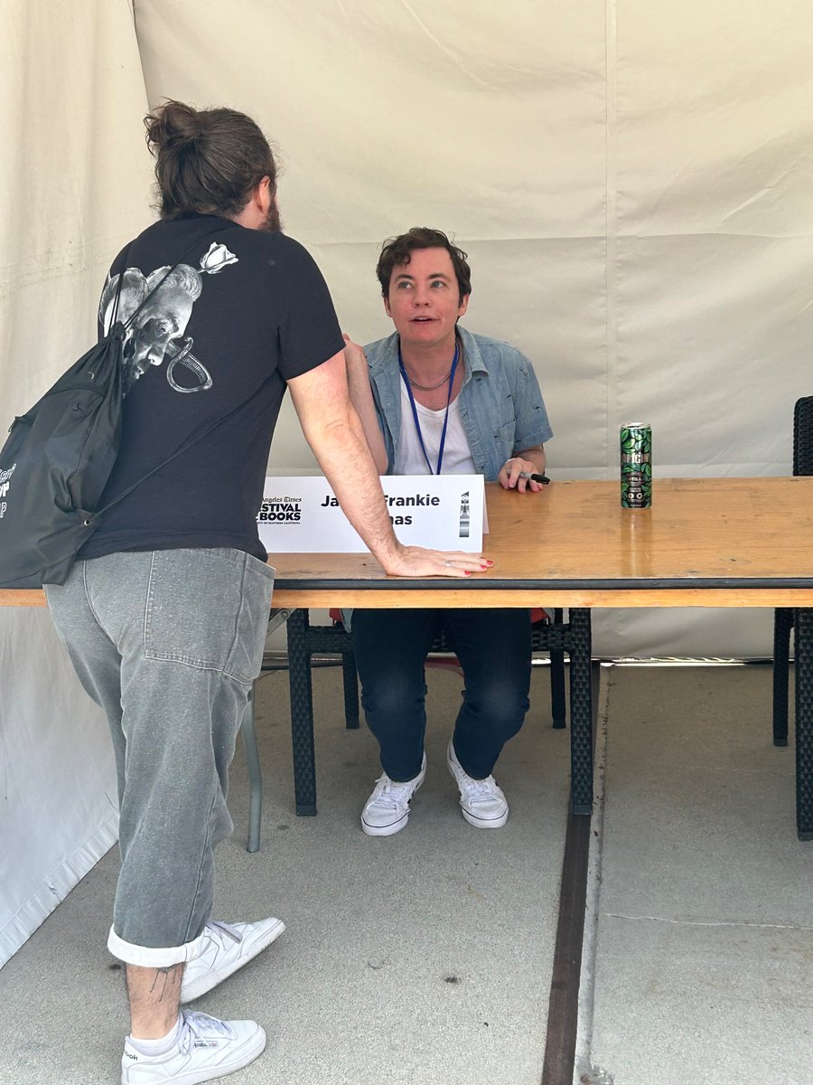 so grateful to my friend for innocently taking a picture at my book event and inadvertently capturing the moment at which I found out that the book festival forgot to stock any copies of my book
