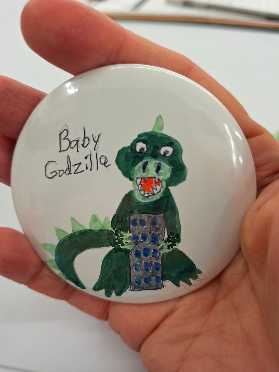 funkyartist's tweet image. Today I went to a free button making workshop at The Space &quot;Free Art for All&quot; in Beltway Plaza in Greenbelt, Maryland. I drew Baby Godzilla looking at his first building ever. #button #buttons #buttonmaking #baby #godzilla #babygodzilla