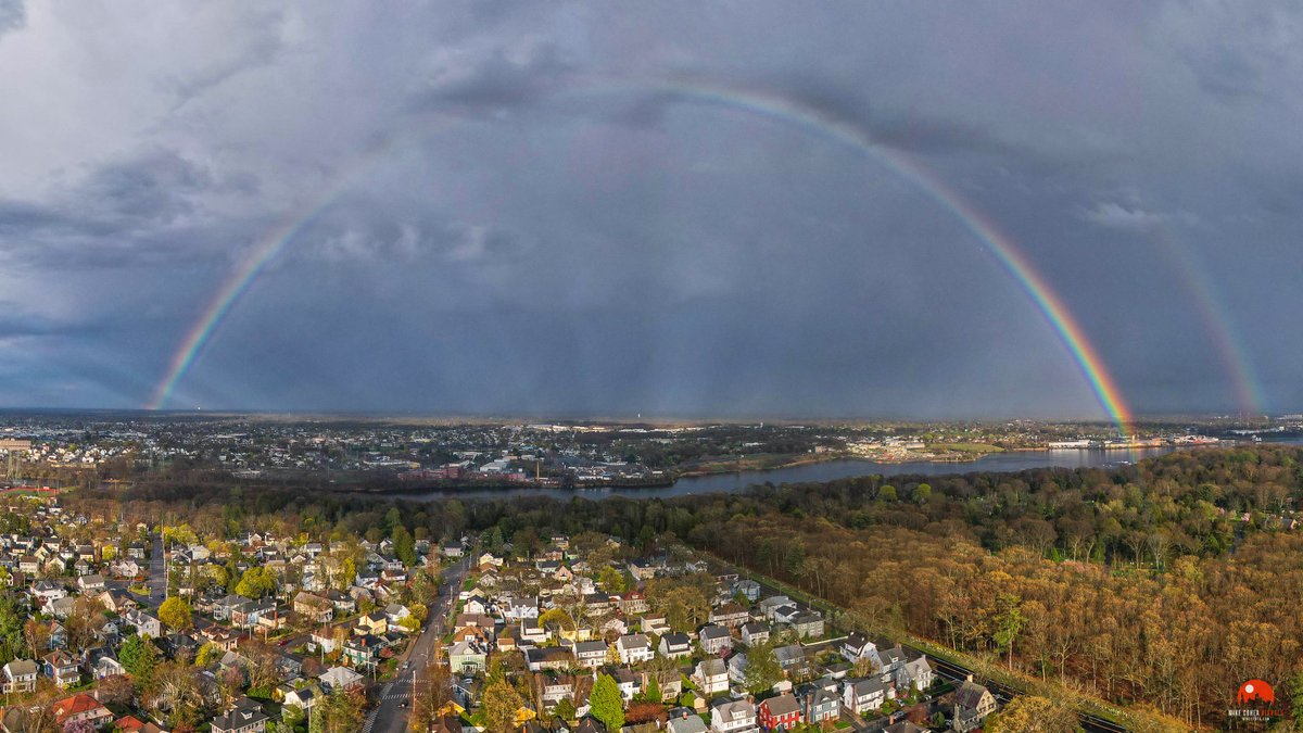 MikeCohea's tweet photo. A partial double rainbow straddles the Seekonk River this afternoon as a fast-moving storm clears out over Providence, RI. https://t.co/qWNNm8IY1a