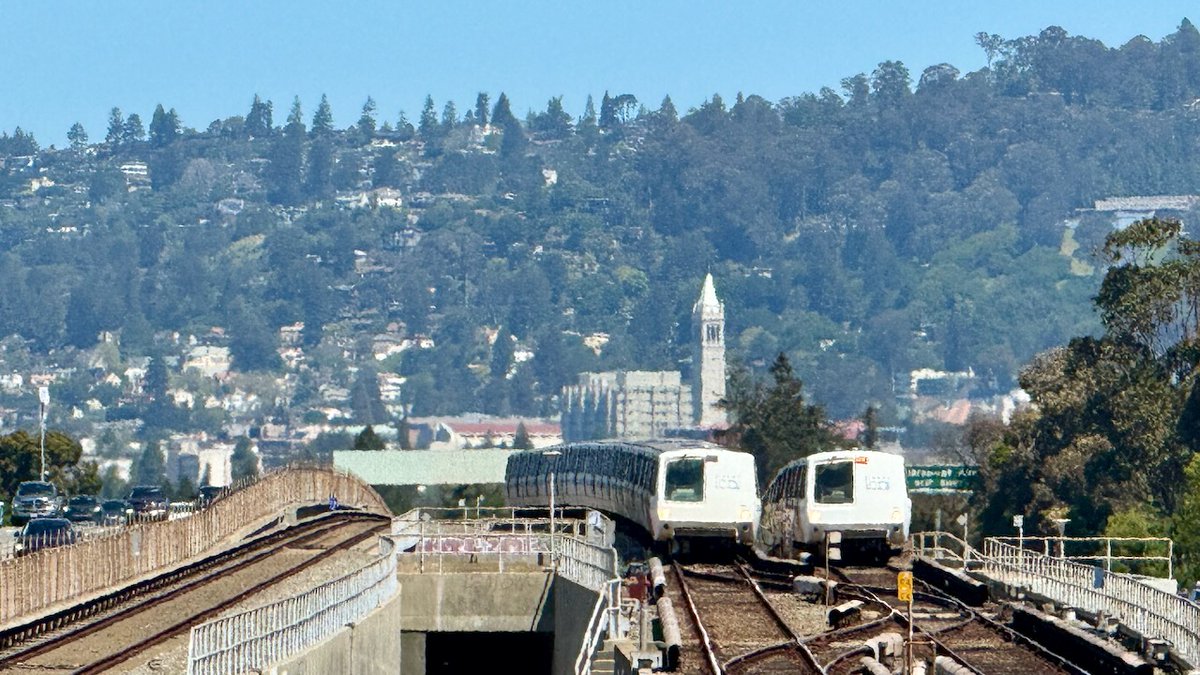 Today is the last day of service for the original BART trains. @SFBART threw a great party. My kids got some cool swag. And I got this awesome pic of the last two legacy BART trains with my @BerkeleyCee office window in the background. Go BART. Go Bears! 🐻