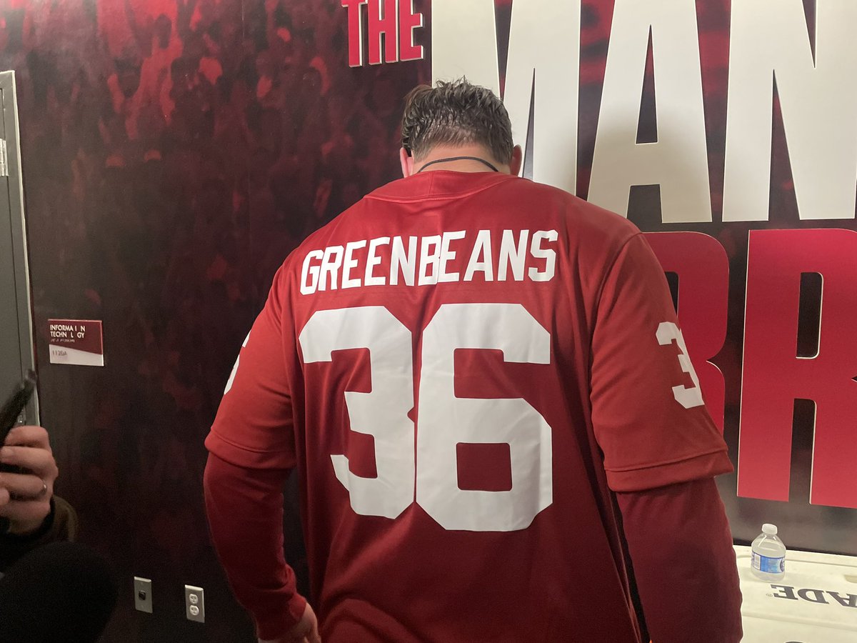 Danny Stutsman with a custom Jimmy Greenbeans jersey + Bob Stoops credential