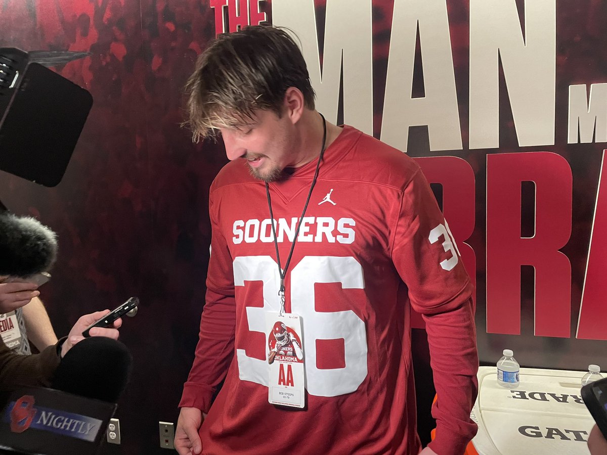 Eddie_Rado's tweet photo. Danny Stutsman with a custom Jimmy Greenbeans jersey + Bob Stoops credential https://t.co/1LtCLwc0KX