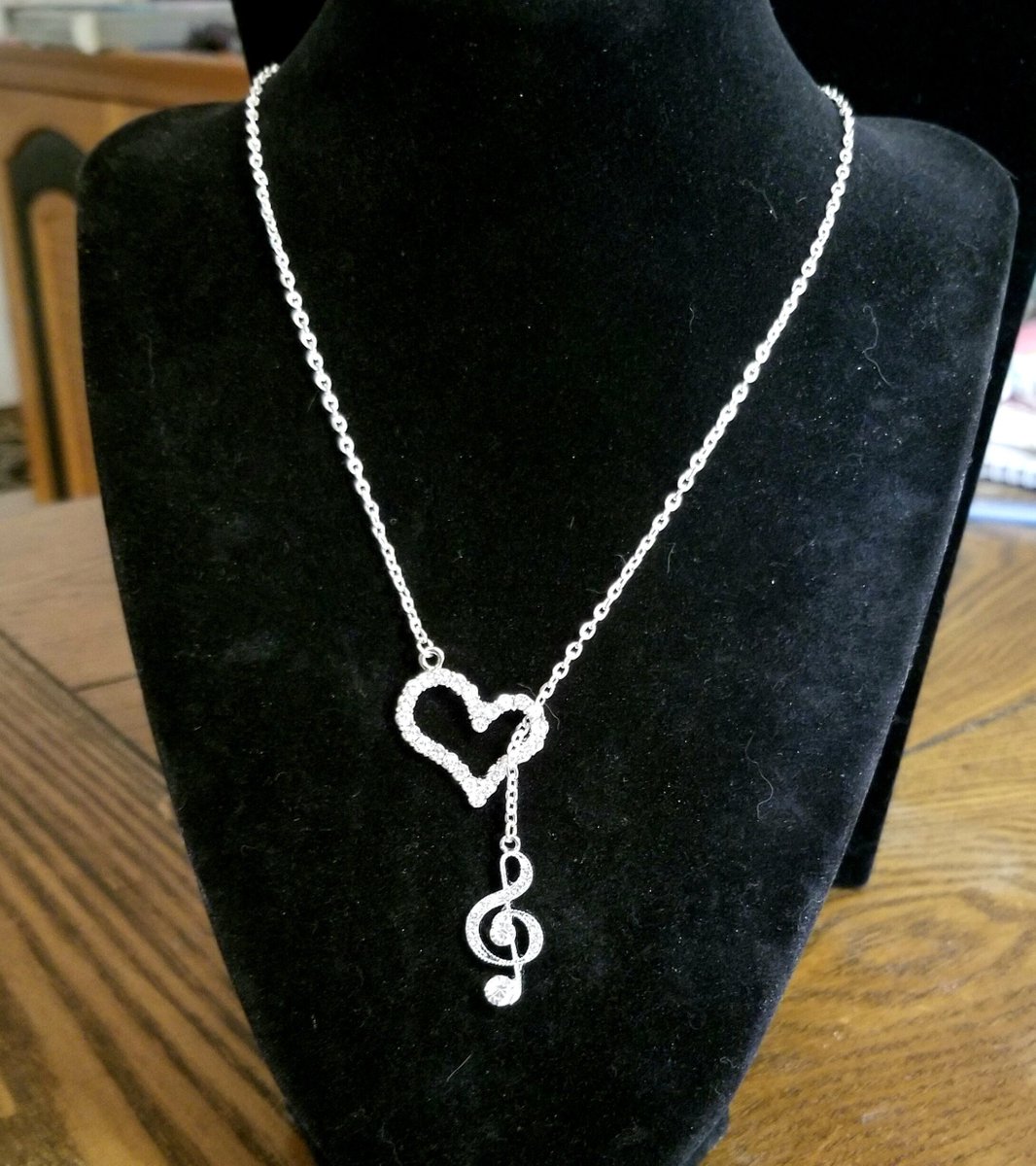 Sterling Silver Treble Clef Lariat Necklace, Crystal Heart Lariat #jewelry #necklace #necklaces #lariat #lariatnecklace #giftsforher #handmadejewelry #Mothersday #Mothersdaygifts #giftsformom #musiclovergift #musiclovers #etsy #musician 

etsy.me/3U5iL6h via @Etsy