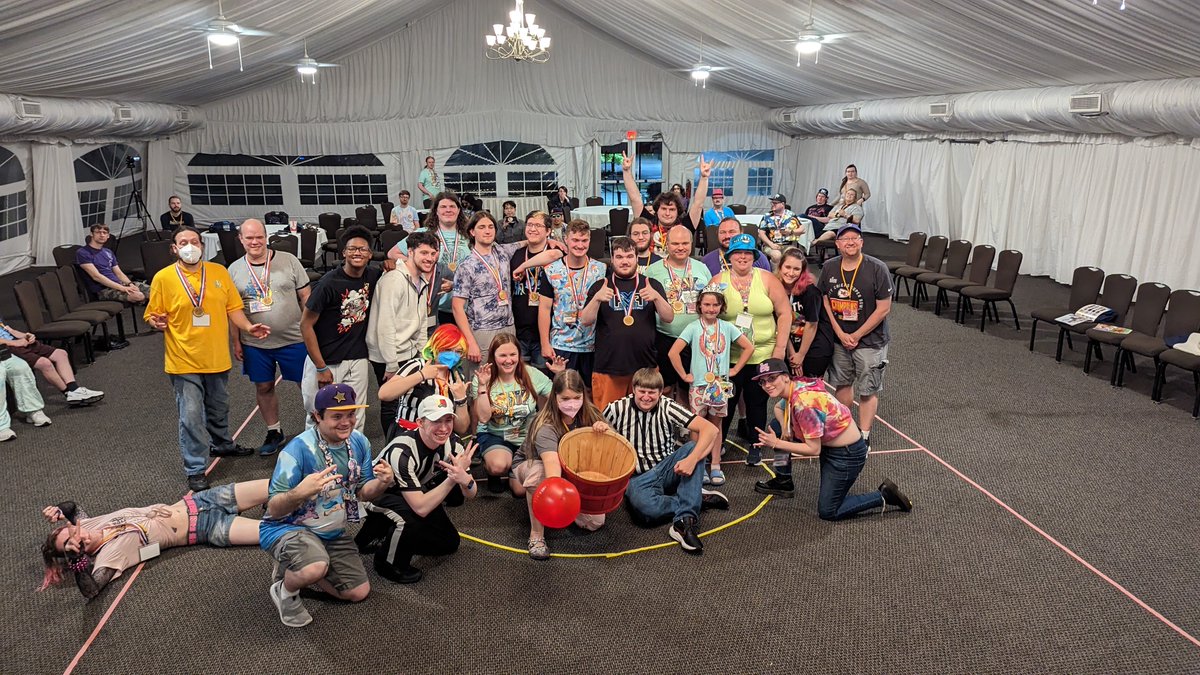 DeeDeeWCPC's tweet photo. What would a Summer Camp be without games? This picture from #WCPC23 of our Buckball Tournament is a great way to get the weekend off to a rousing start and is something that you’re not going to want to miss at this year’s Whinny City Pony Con!

#ThrowbackThursday https://t.co/delmT4duC8