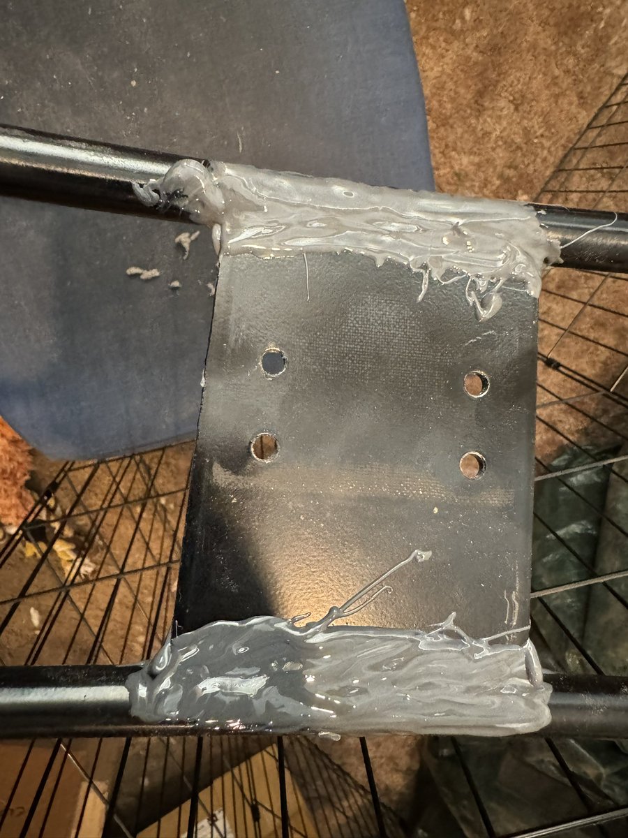 My office chair died last week, as the welded plate holding the back on broke off

I've ordered a fancy new Steelcase chair, but until that arrives I've used some JB Weld epoxy to reattach the plate and… I think it's working???