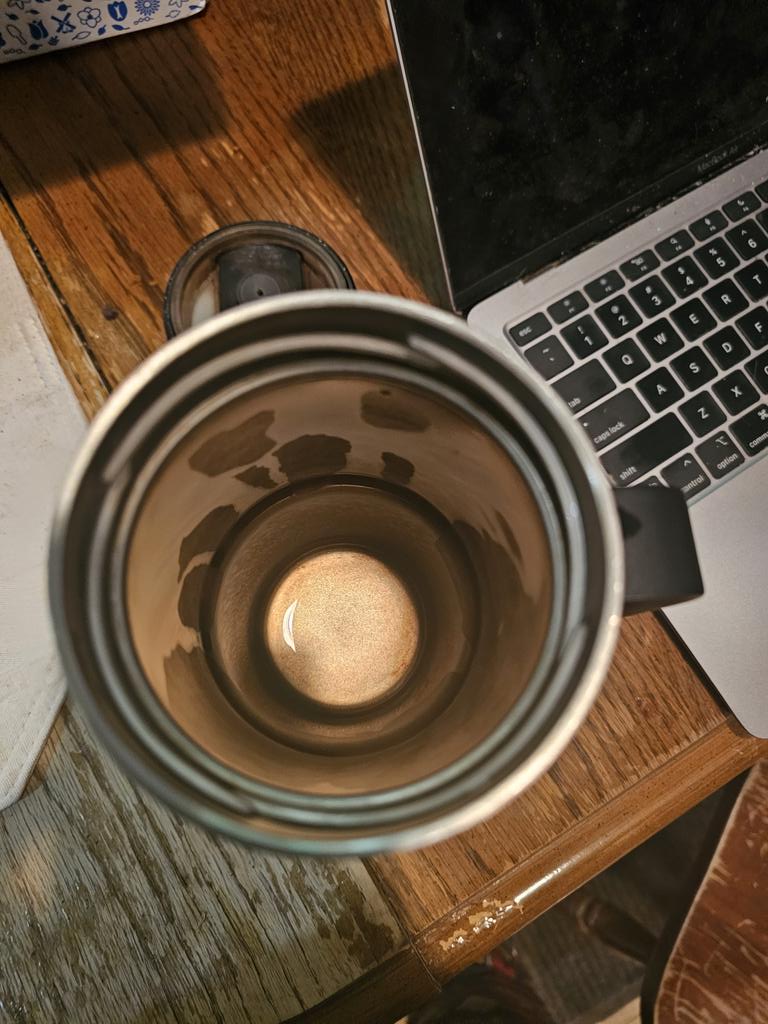 Should I be concerned that the bottom of my stainless steel coffee mug is the same color as a full moon in October?