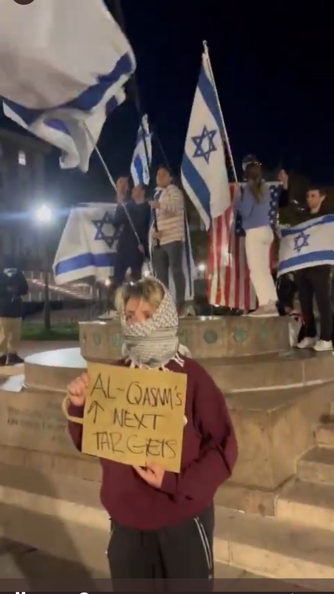 Someone sent me this from Columbia tonight. Some Jewish students were holding Israeli and American flags so this girl stood in front of them with the below sign. Al-Qasam is the Hamas military wing. They are openly pro-Hamas and threatening fellow students.