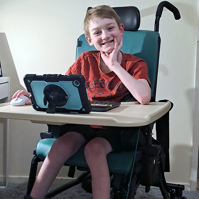 Henry is working hard at walking short distances with his wheeled walker, but needs this chair for crucial support to prevent scoliosis. It also provides better conversation and connection with others at meal times and in many other activities. #makeadifference #beneficiarystory