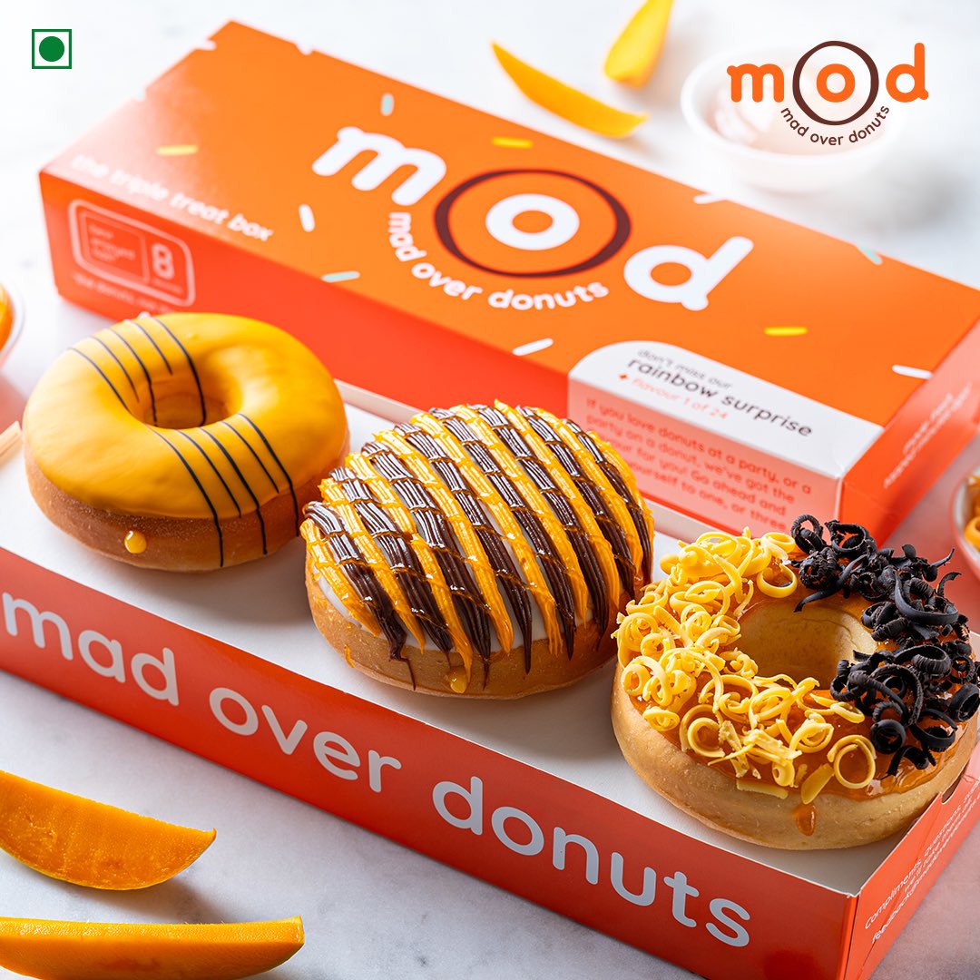 Our mango donuts are here to brighten up your day and fill it with pure bliss! ☀️🥭 Share your #MangoliciousMoments with us in the comments below! #MOD #MadOverDonuts #BiteIntoHappiness #Donut #Love #NewLaunch #Mango