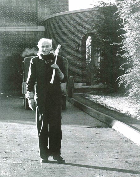 Physicist Paul Dirac, pictured on the grounds of the IAS, ca. 1962. Dirac would often set off on Saturday mornings with an axe over his shoulder to help Institute’s faculty members clear paths in the Institute Woods. (Photographed by Dirac’s daughter)