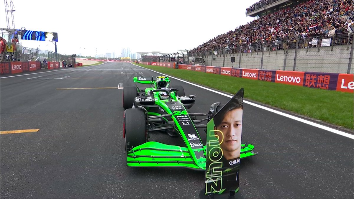 zhouguanyus's tweet photo. honestly... thank you so much for the organizers for allowing zhou this moment. to be the first chinese f1 driver ever, driving at his home race, that's something to be remembered forever https://t.co/L9cJoV03Ge