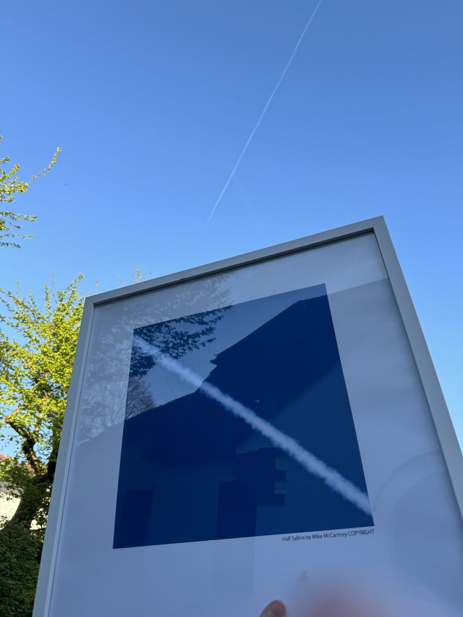 Josh holds up his framed photo of my ‘1/2 a Saltire’ taken in #Scotland, against a sunny(for a change!) #Merseyside sky