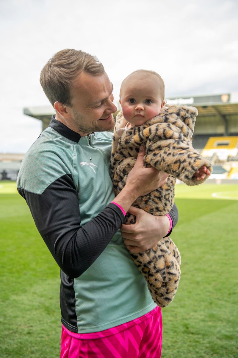 BeckySlingsby's tweet photo. Another season nearly over… what a difference a year makes! Yesterday Cece got to make her first appearance on the pitch at Meadow Lane with her daddy 🖤🤍 hopefully it’s not her last. We love you @Official_NCFC https://t.co/N2P6qYkPSZ
