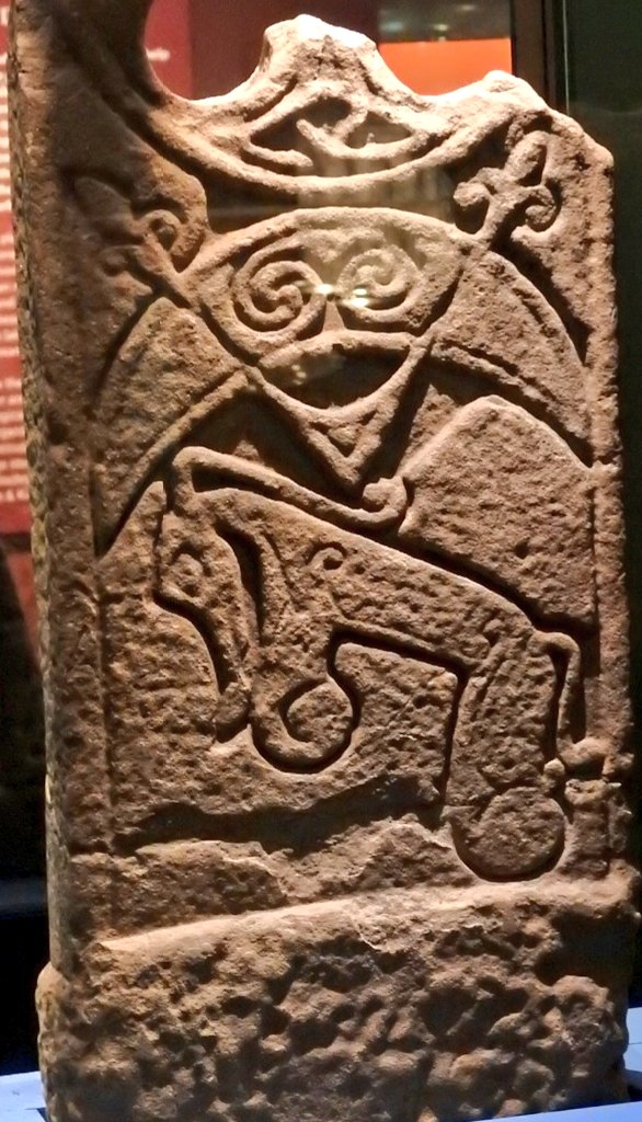 Part of a Pictish stone cross from Murthly (east of Dunkeld) with various symbols, probably significant markers of Pictish identity: the crescent & 'V-rod' at the top, above a fantastic hybrid monster. Perth Museum. #StoneworkSunday