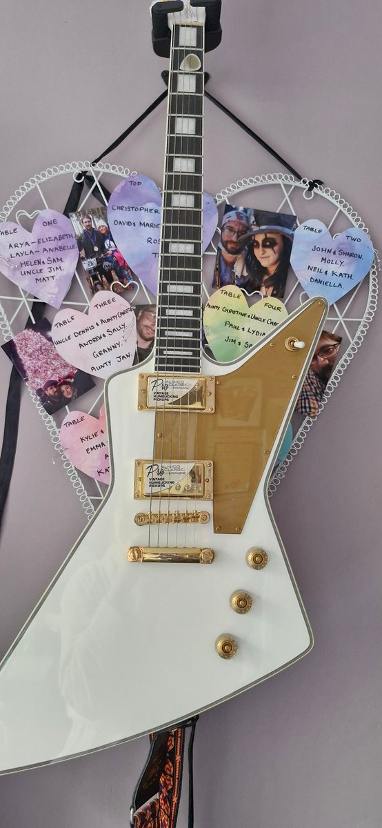 LauraPa73159755's tweet photo. Better view of my #wedding artwork @LZZYHALE #epiphoneexplorer 🎸 #2weeksmarried🖤 https://t.co/JB6xvfix5e