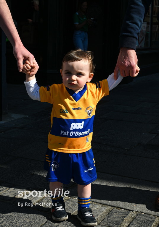 A good day for your first Championship outing! Eighteen month old Seán Faron from Kilfilun in Clare, with his dad and grandad, before the Munster SHC match between Clare and Limerick at Cusack Park in Ennis. 📸 @Sportsfileray sportsfile.com/more-images/77…