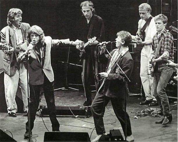 Paul McCartney, Mick Jagger, Mark Knopfler, David Bowie, Mark King, and Bryan Adams together in London 1986.