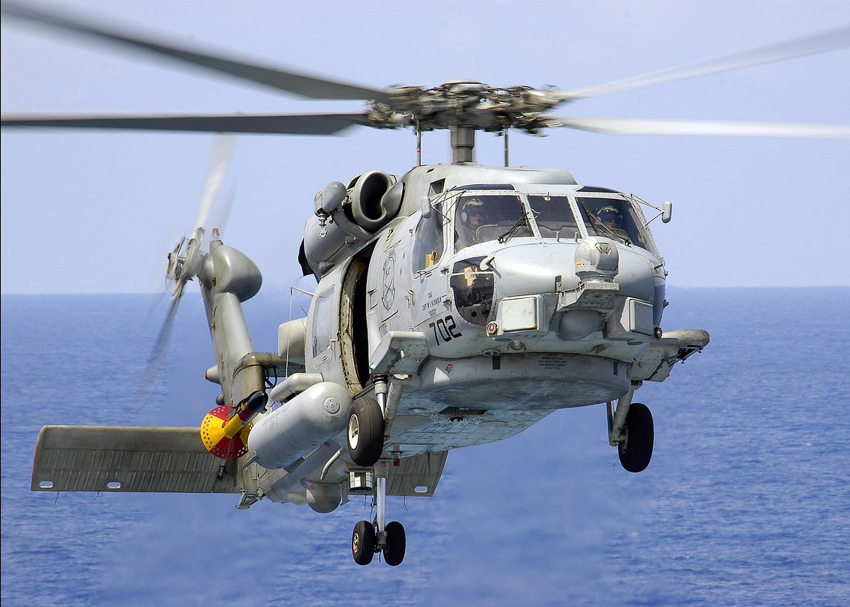 A #USNavy SH-60B Seahawk assigned to the Saberhawks of Helicopter Anti-submarine Squadron Light Four Seven (HSL-47) prepares to land aboard the Nimitz-class aircraft carrier USS Abraham Lincoln