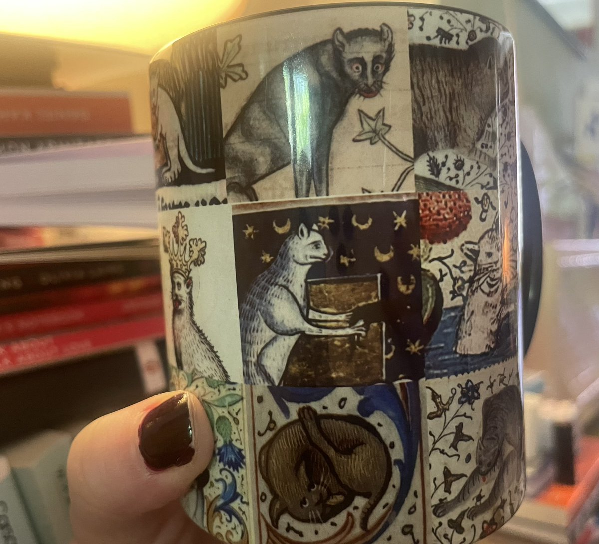 Lie in post rED Cambridge calls for coffee in a medieval cat mug