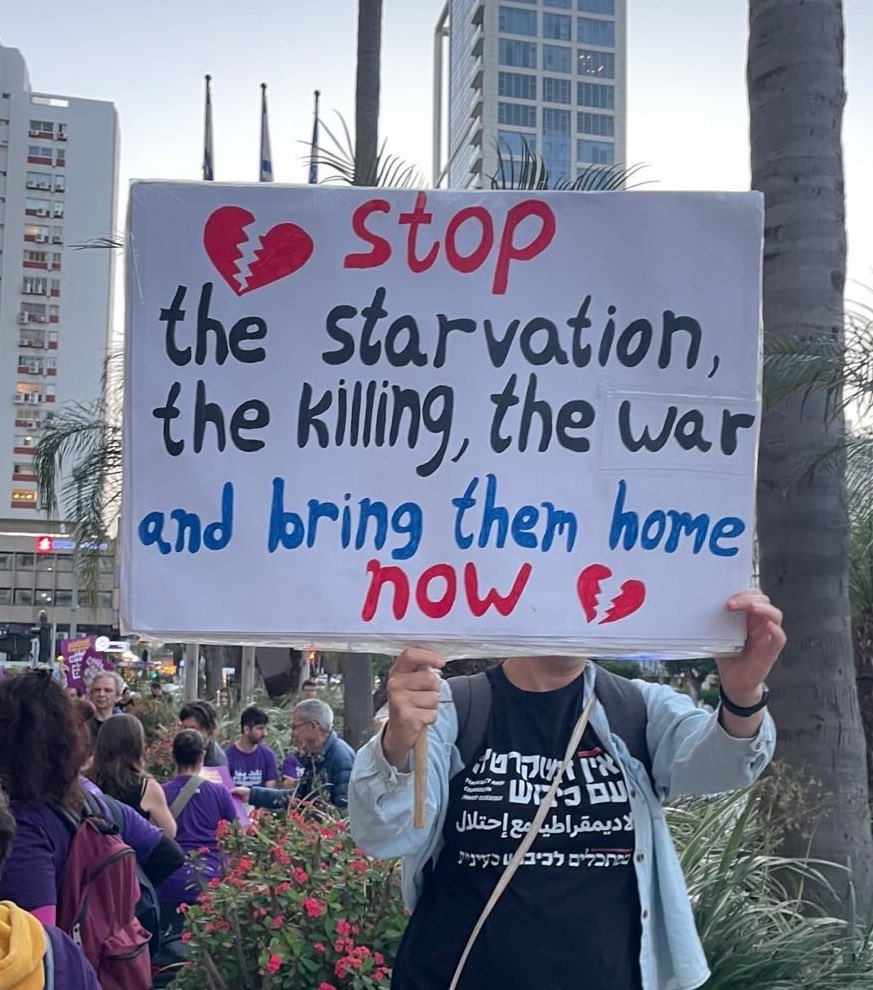 From the protest last night in TLV - Her shirt says “no democracy with occupation”