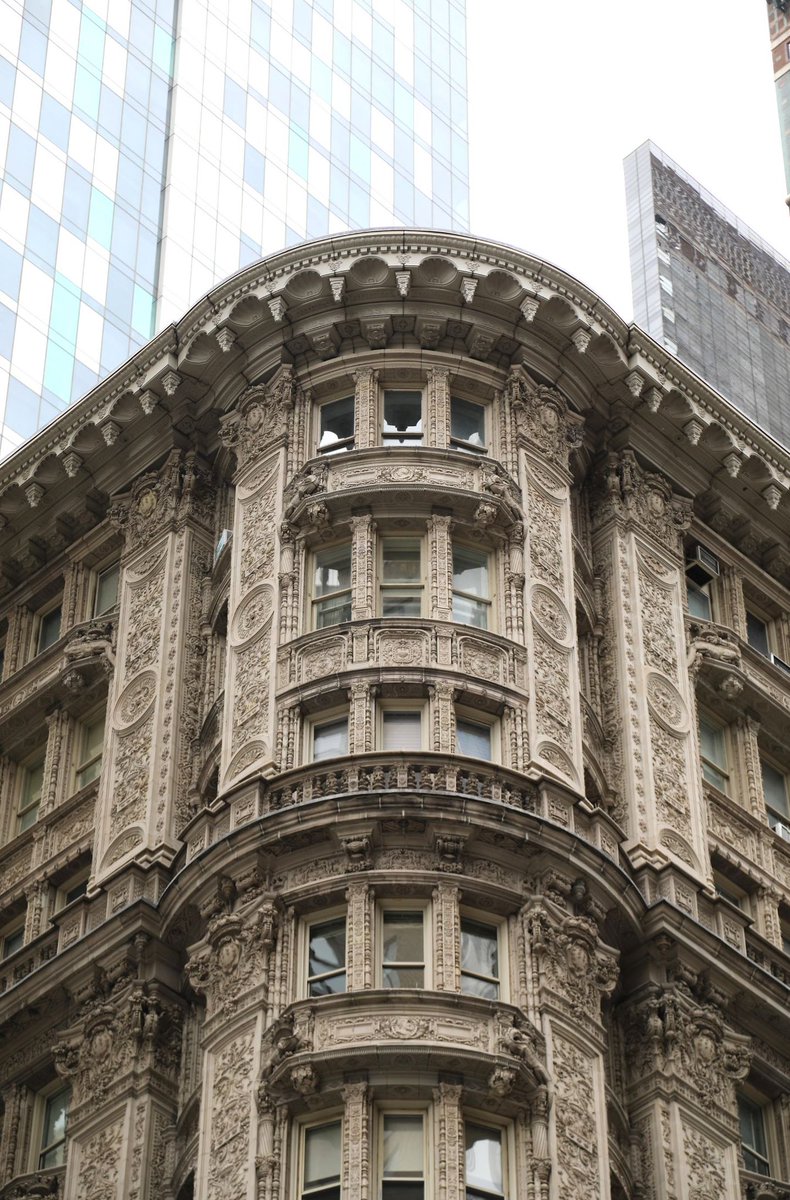 And a new NYC favourite: love this ornate corner building surrounded by glass and steel #newyorkcity