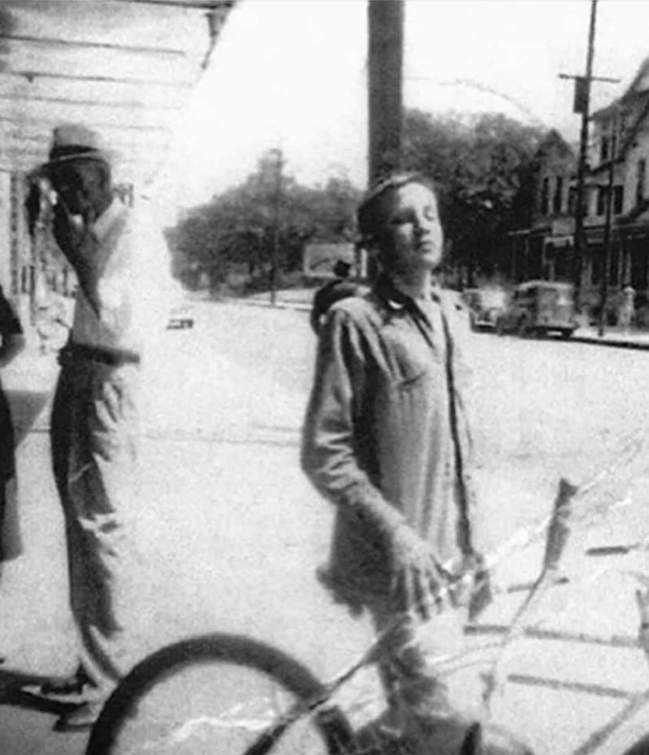 In 1947 a woman was walking into a drug store in Tupelo, MS to drop off film to be developed. She realized as she was walking in she had one exposure left. She noticed a young kid outside the drugstore and asked him to pose with his brand new bicycle so she could finish the roll